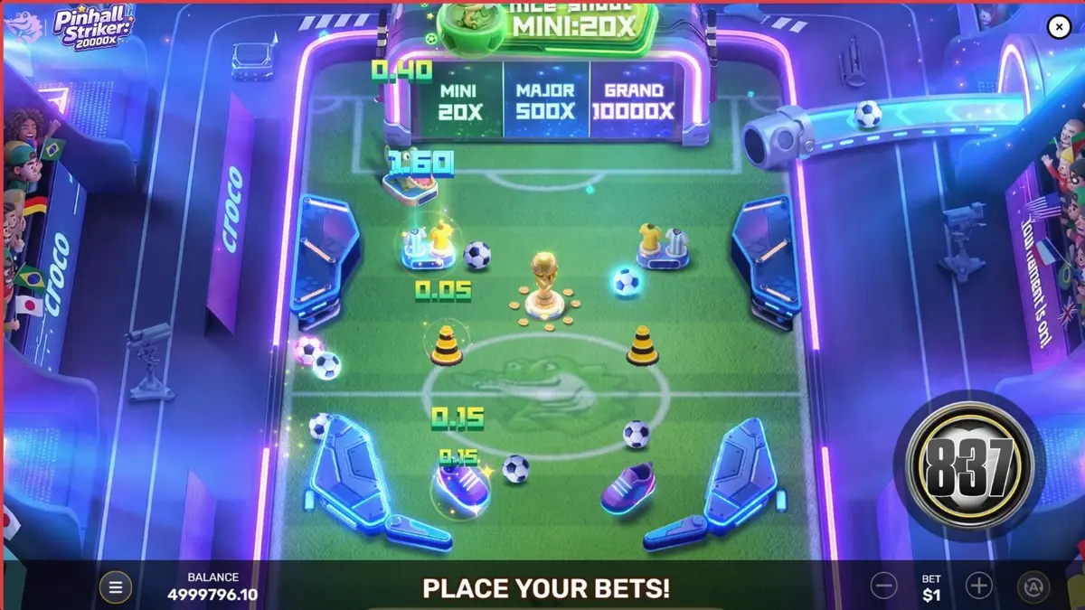 Tampilan permainan Pinball Striker 20,000x dengan latar stadion neon dan elemen pinball